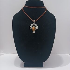 Brown Tiger's Eye Pendant Necklace with Silver Accent On Brown Faux Suede Cord